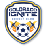 Shield logo for Colorado Ignite Soccer Club featuring flaming torches, a soccer ball, and bold blue and orange text.